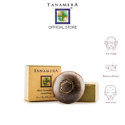 Tanamera Black Formula Facial Soap shown with its gold-colored packaging box and a round dark brown soap bar in the center. The image is set against a white background with three purple icons on the right detailing the product's benefits: '3 in 1 Soap', 'Reduce oiliness', and 'Anti-acne'.